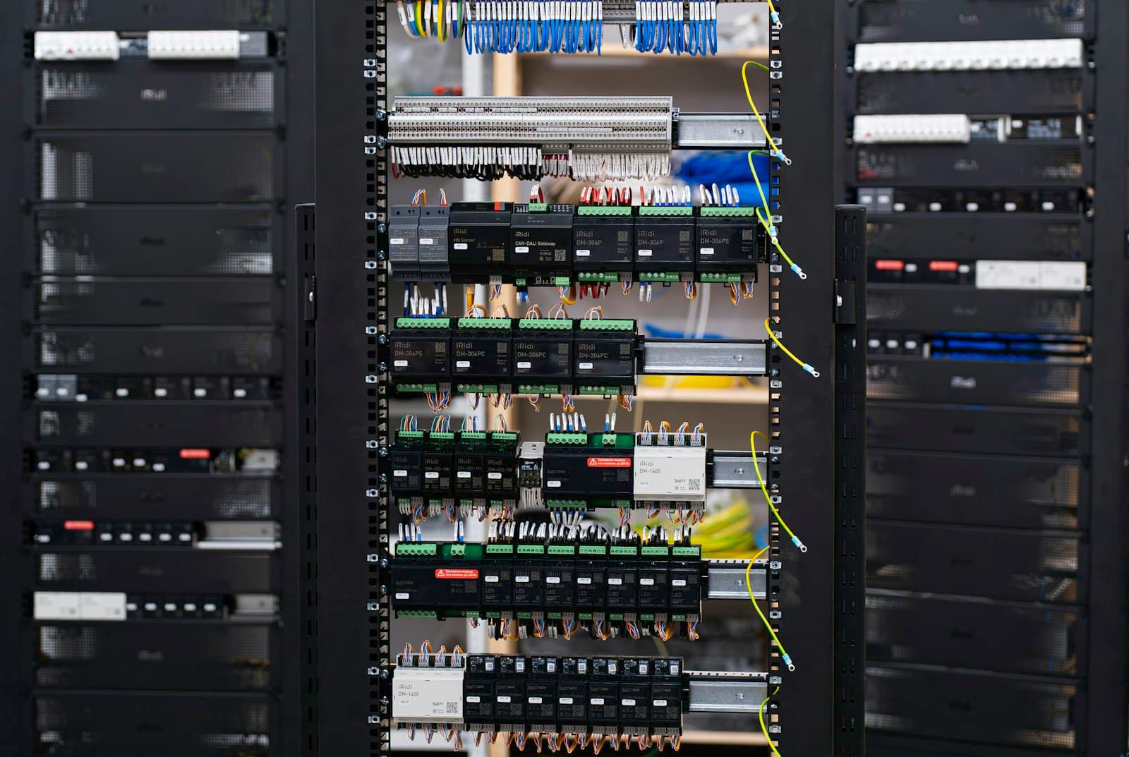 Open electrical panel with circuit breakers and wiring